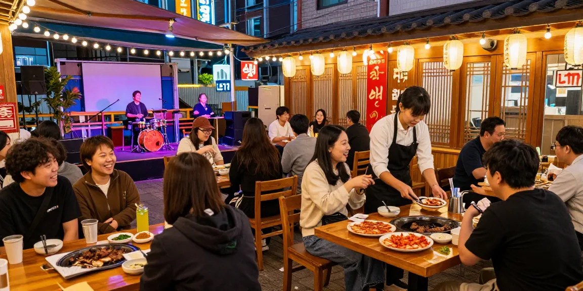 Explore the lively atmosphere at 상봉동 한국관나이트, where guests savor Korean cuisine in a vibrant setting.